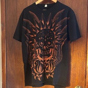 Studio 21 Tattoo Gallery Next Level Apparel Black and Orange Skull Tee